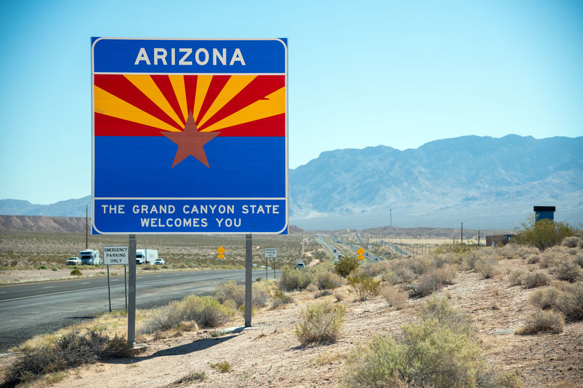 Welcome to Arizona road sign along State Route, USA.